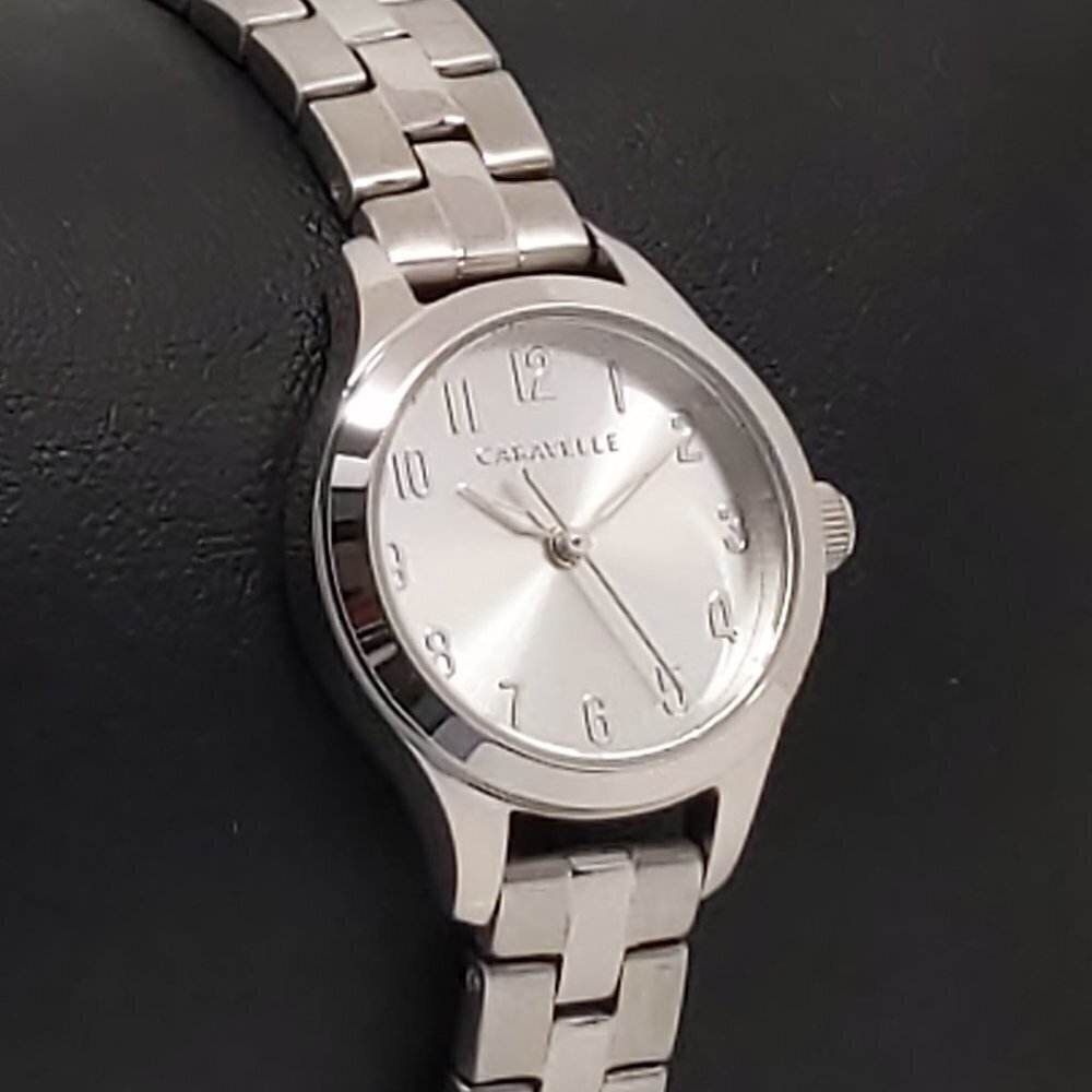 Caravelle Ladies Quartz Watch By Bulova Silvertone White Dial 24mm - Picture 2 of 12